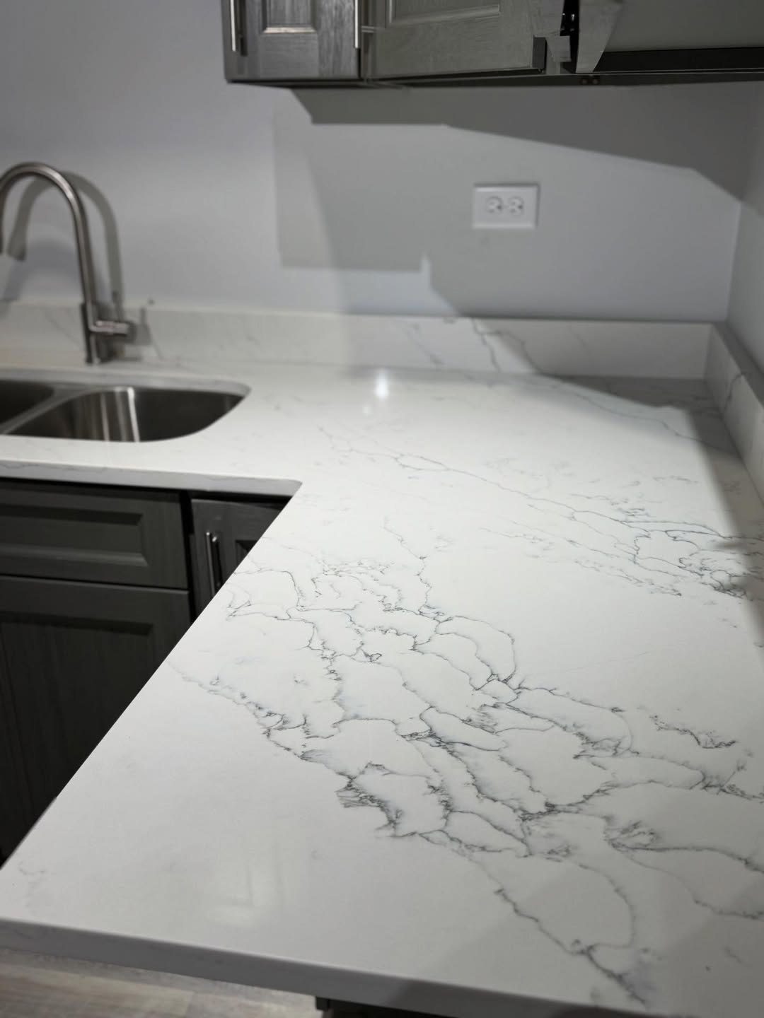 Veined Quartz Countertop & Backsplash — custom stone countertop project by Chicago Stone Gallery, Addison IL
